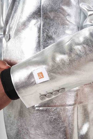 Man wearing shiny silver suit 