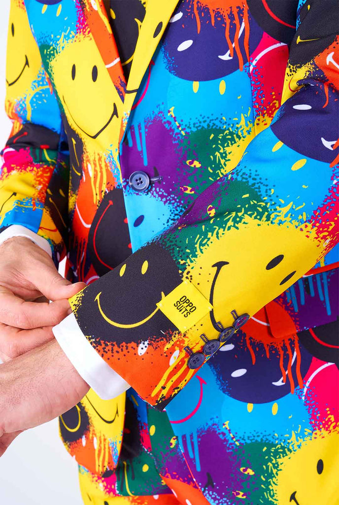 Man wearing colorful men's suit with Smiley print