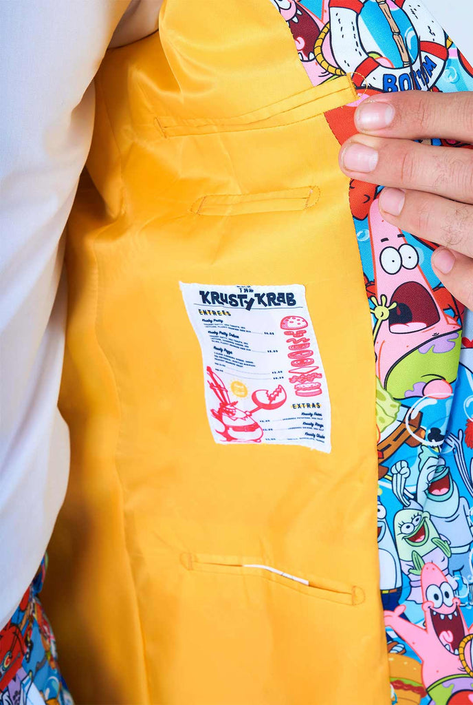 Man wearing men's suit with SpongeBob print 