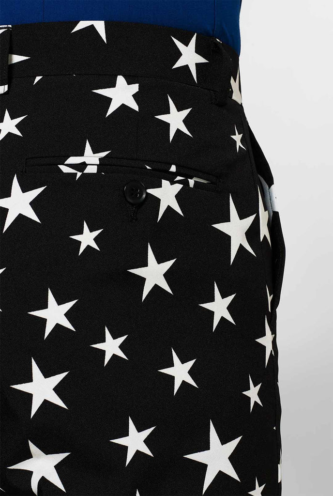 Men wearing black suit with white stars