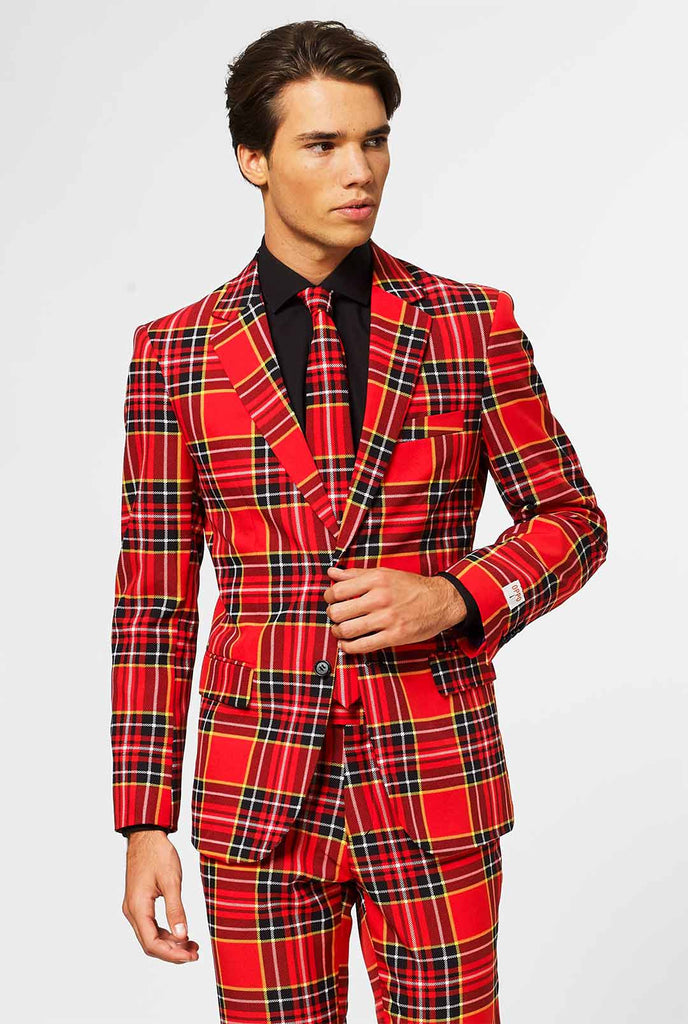 Man wearing red Christmas tartan men's suit