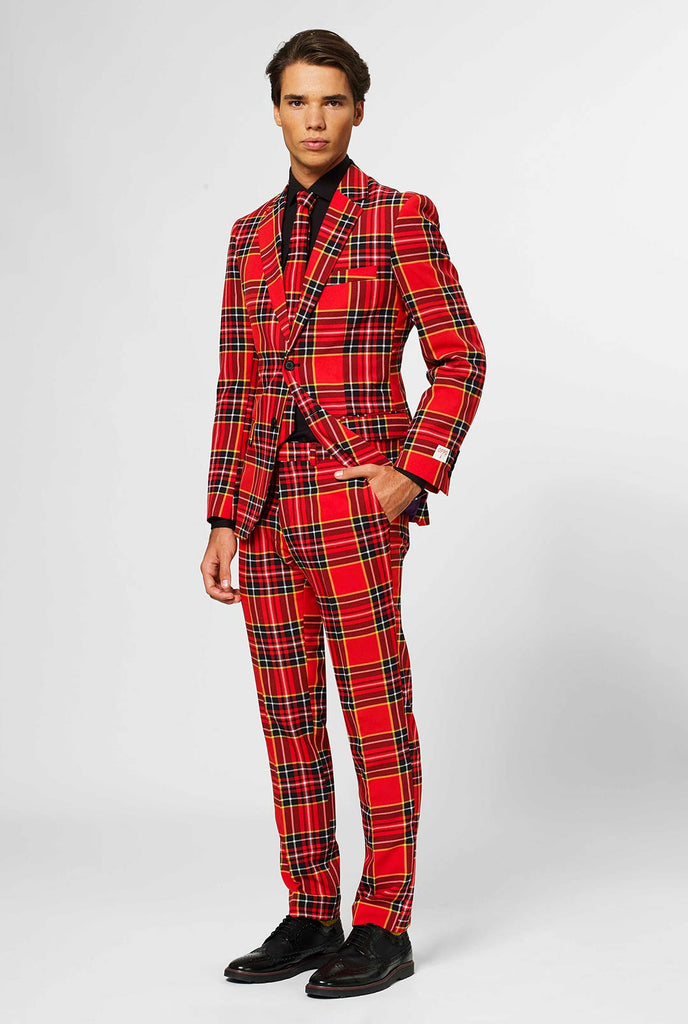 Man wearing red Christmas tartan men's suit