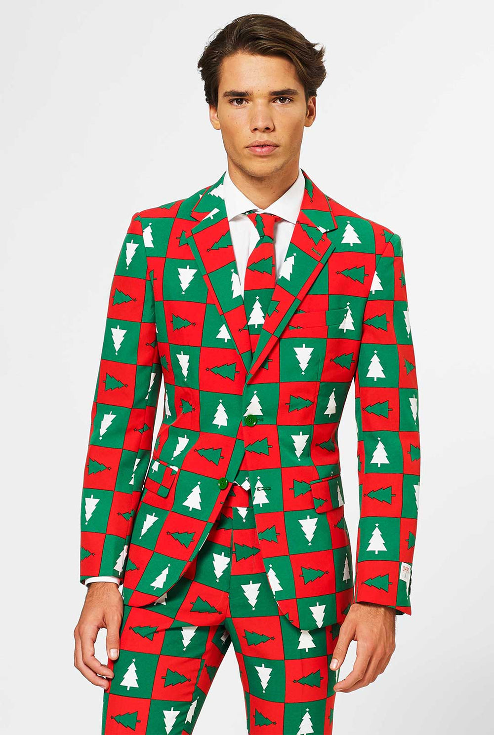 Man wearing red and green Christmas suit