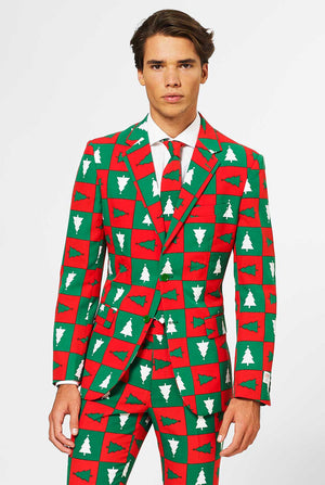 Man wearing red and green Christmas suit