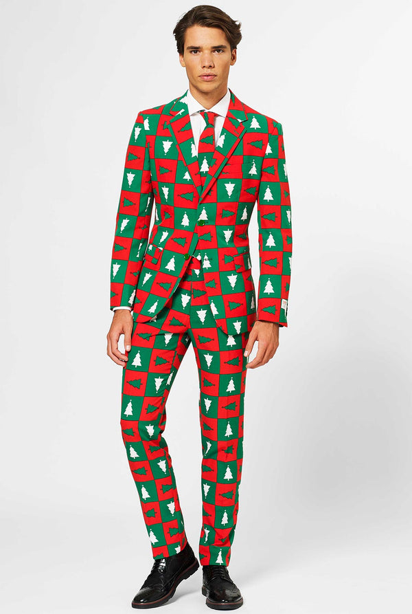 Man wearing red and green Christmas suit