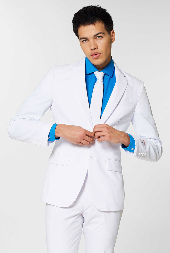 All white men's suit worn by man