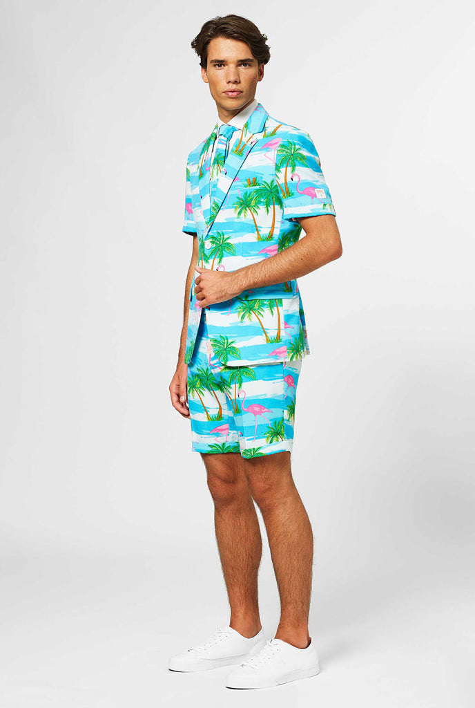 Man wearing summer suit with tropical flamingo print