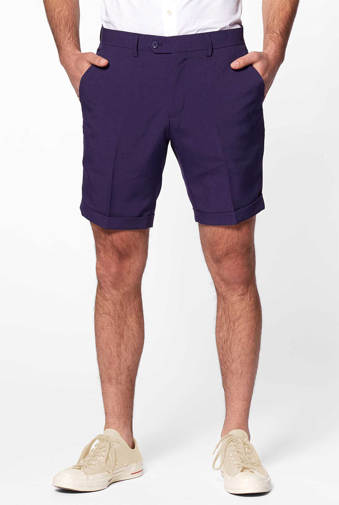 Man wearing summer suit with palms and sunset print