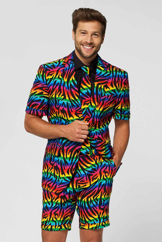 Man wearing summer suit with rainbow zebra stripes print