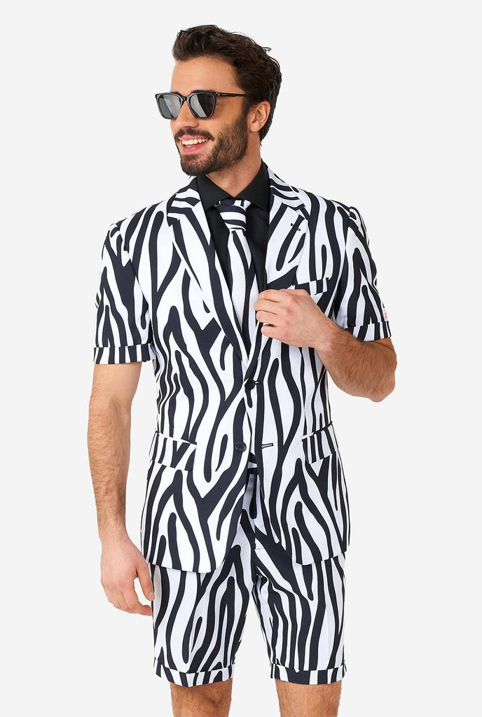 Man wearing summer suit with black and white zebra stripes