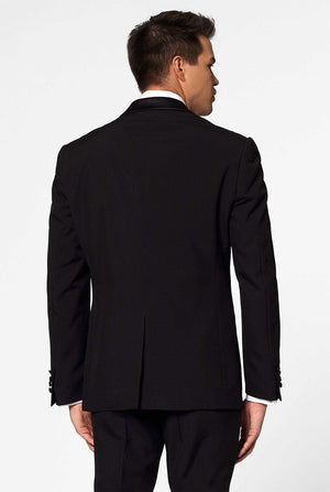 Solid black tuxedo suit Jet Set Black worn by man close up
