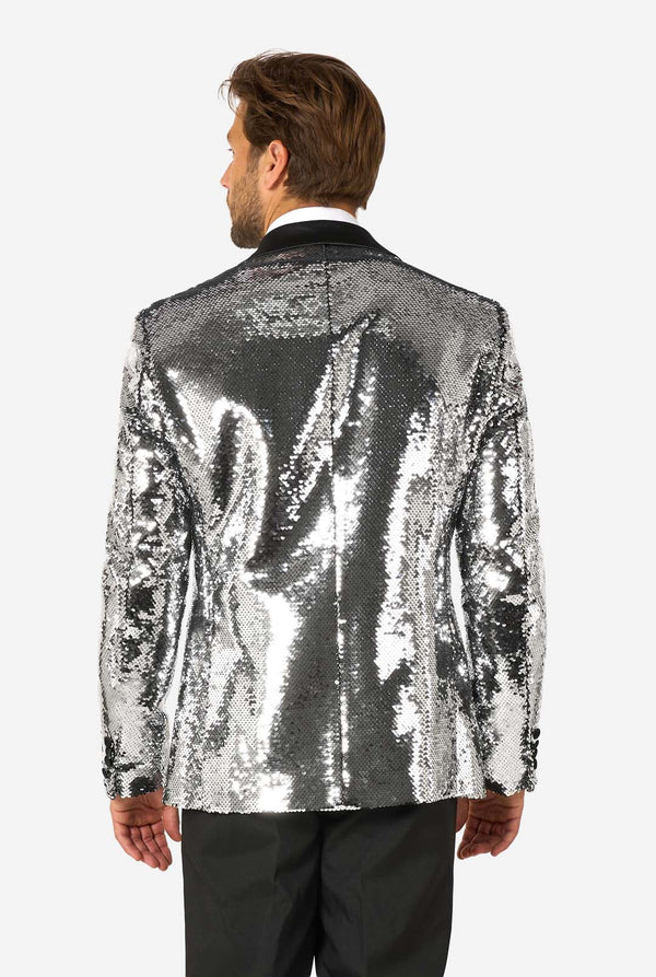 Man wearing a silver sequin blazer on a white background
