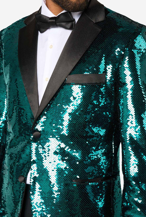 Green sequin tuxedo with black lapels and bow tie on a white background