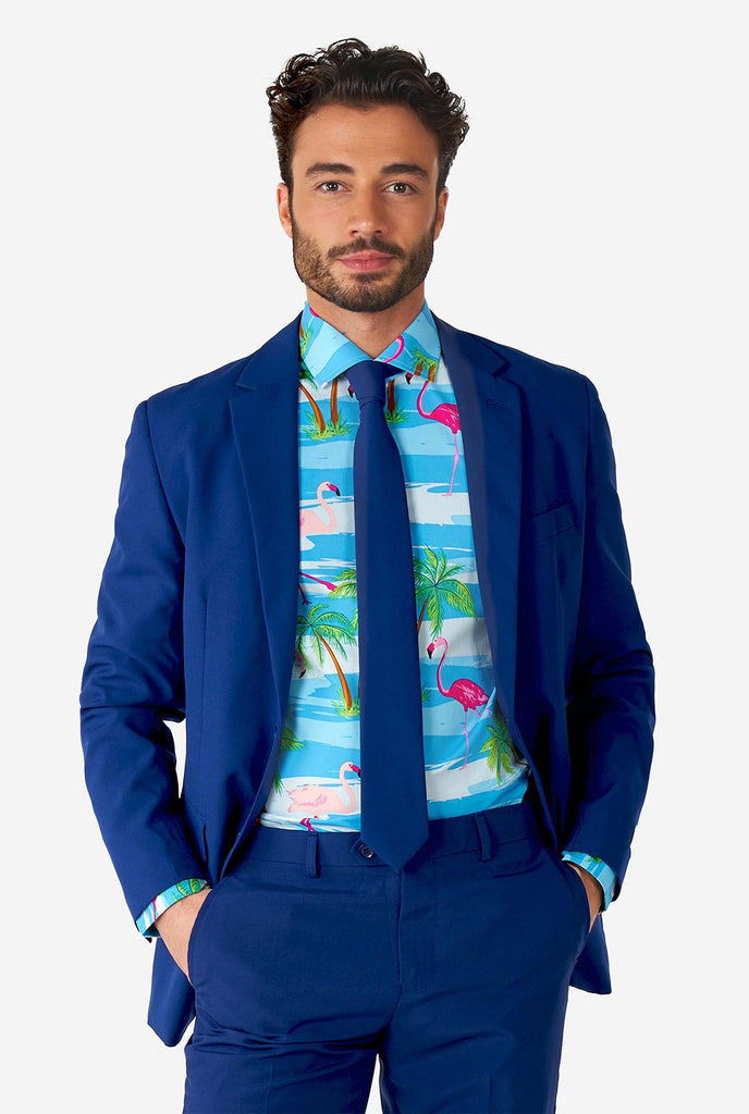 Man wearing Hawaiian dress shirt with tropical flamingo print