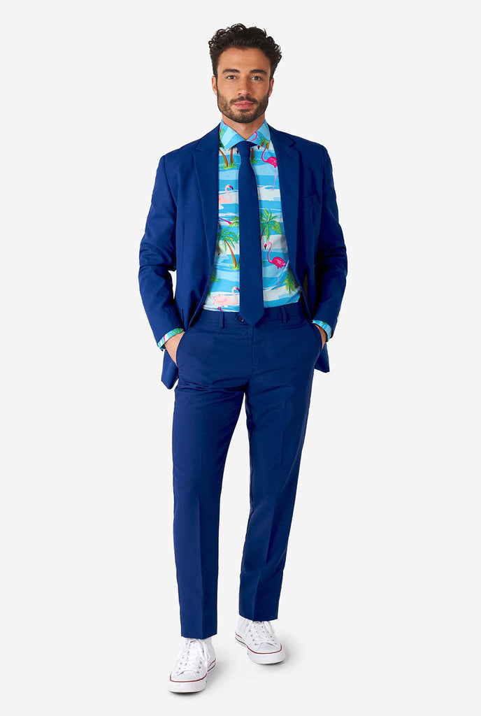 Man wearing Hawaiian dress shirt with tropical flamingo print
