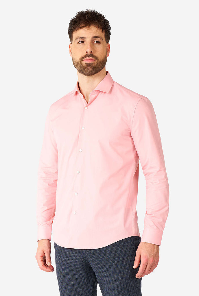 Man wearing soft pink dress shirt