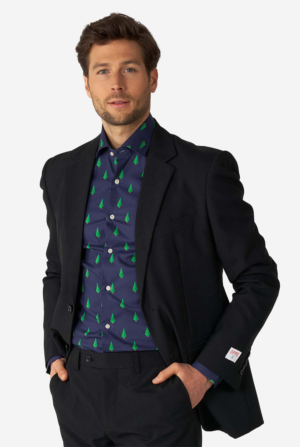 Man wearing blue dress shirt with Christmas tree print