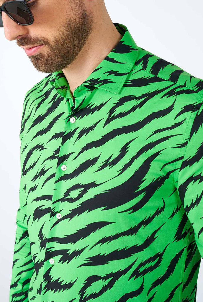 Man wearing neon green dress shirt with tiger stripes 
