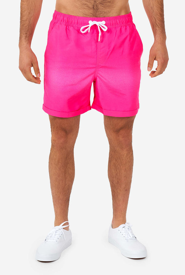 Man wearing colorful summer shorts and shirt