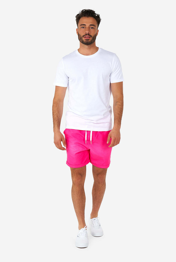 Man wearing colorful summer shorts and shirt