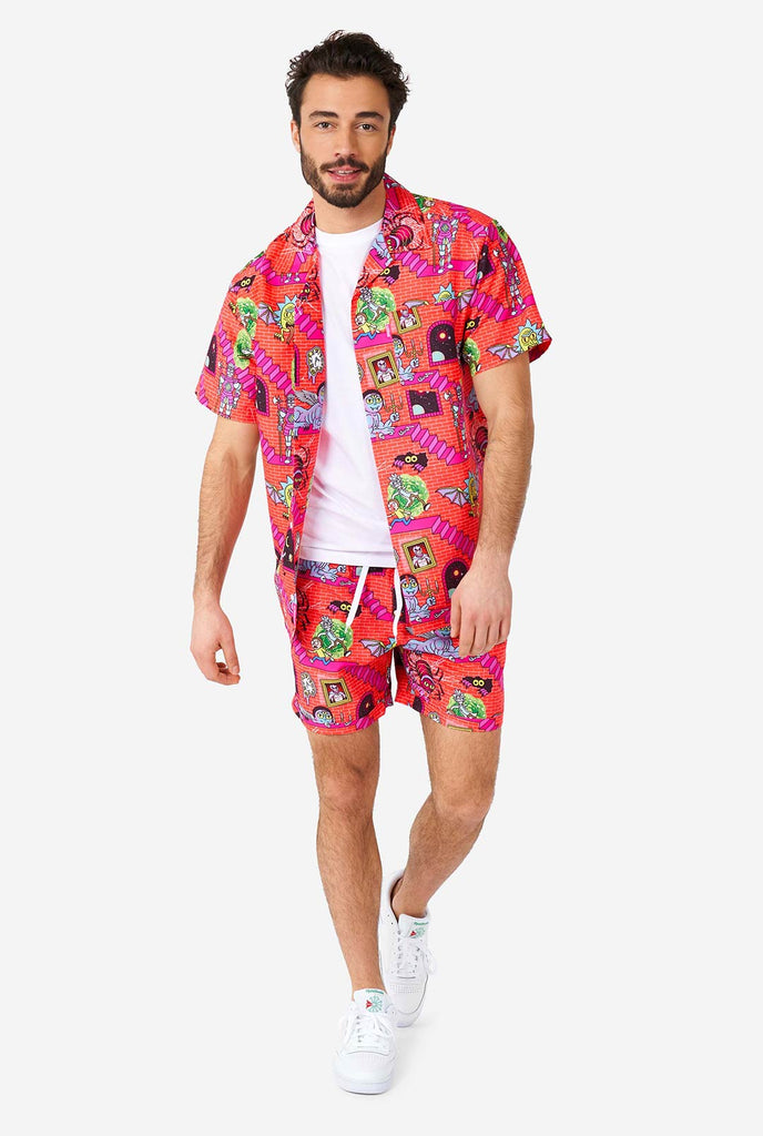 Man wearing summer outfit, consisting of short and shirt, with Rick and Morty print