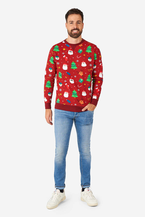Man wearing red Christmas sweater with Christmas icons