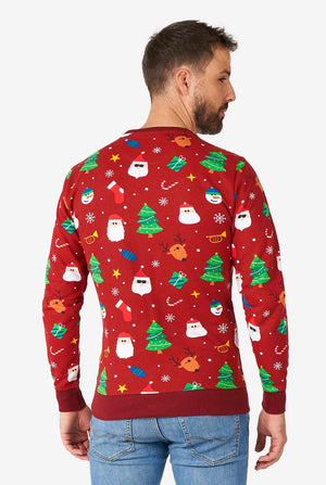 Man wearing red Christmas sweater with Christmas icons