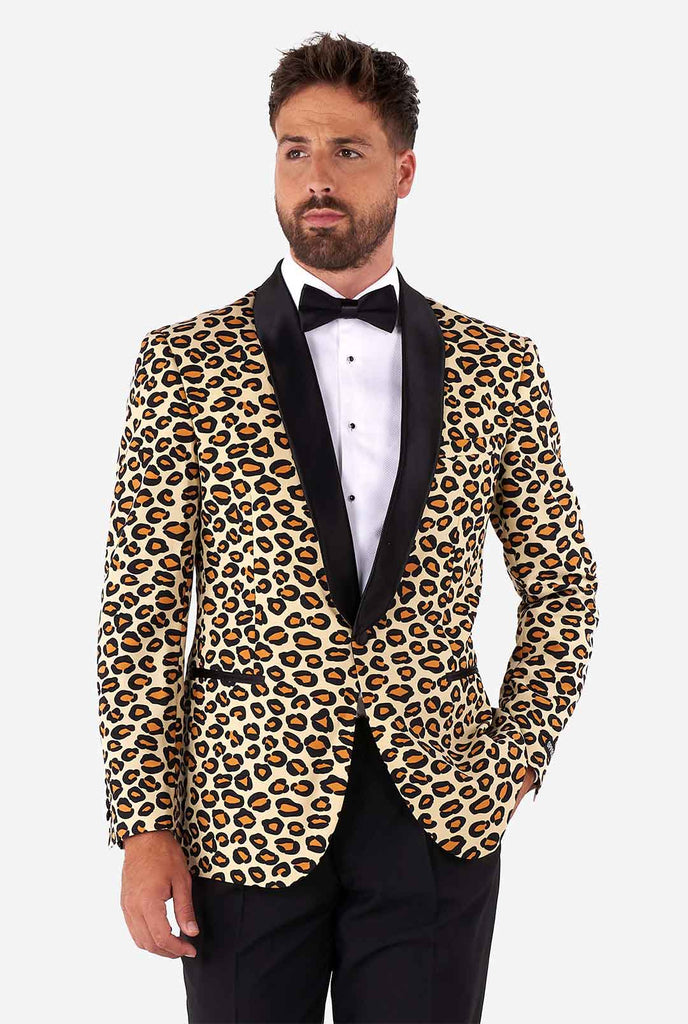 Man wearing tuxedo with jaguar print jacket