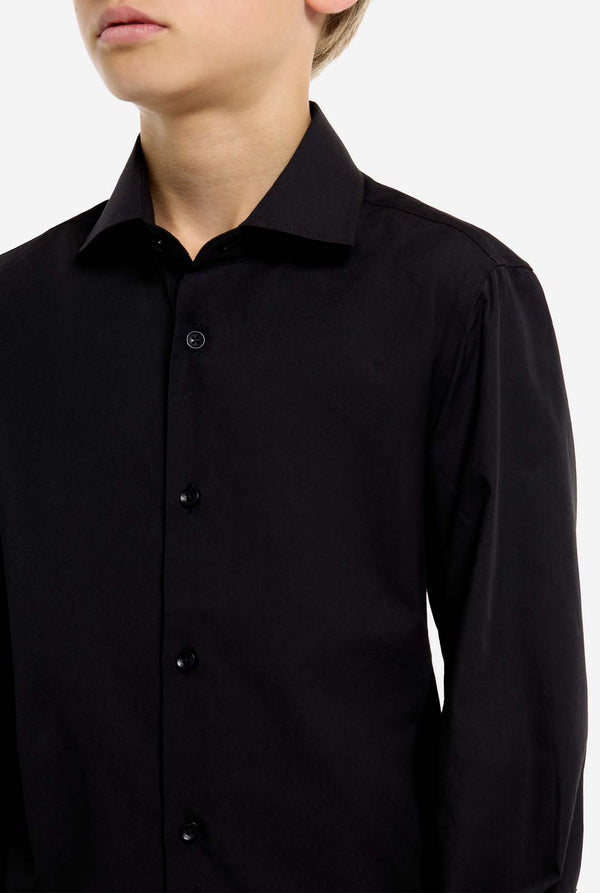 Black dress shirt worn by a person on a white background