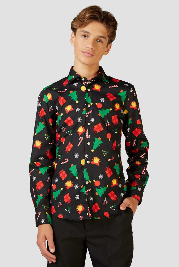 Funny black Christmas icons dress shirt worn by a teen boy view from back