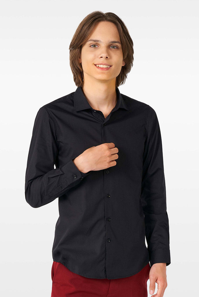 Teen wearing black dress shirt