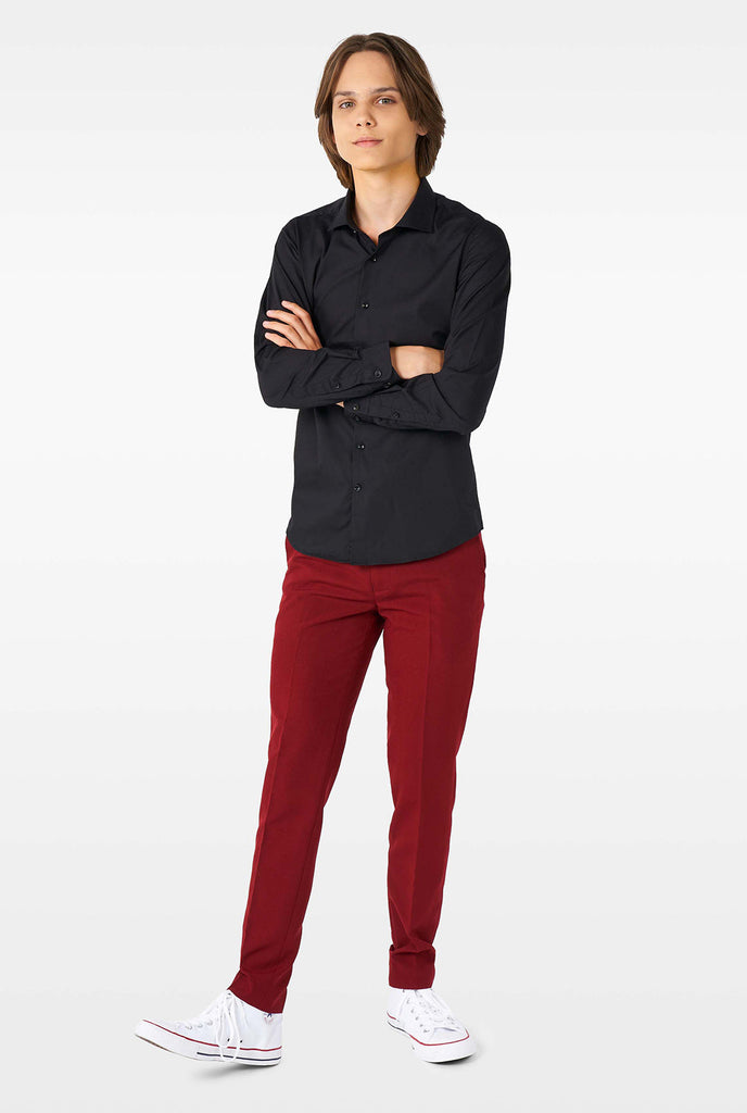 Teen wearing black dress shirt