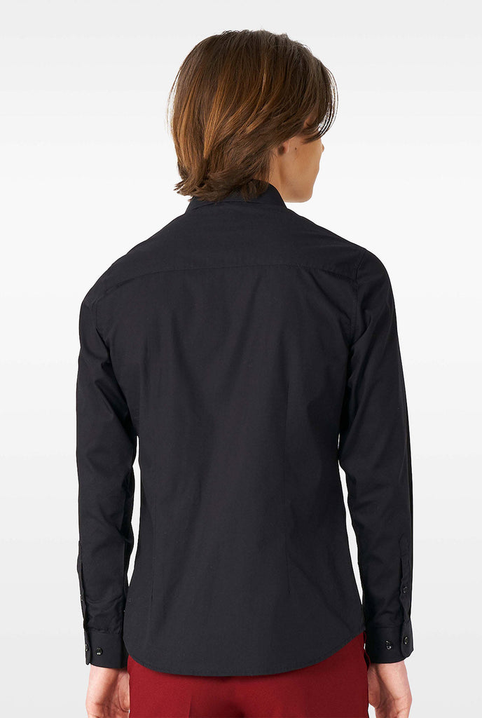 Teen wearing black dress shirt