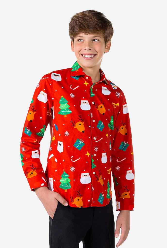 Teen wearing red dress shirt with Christmas print