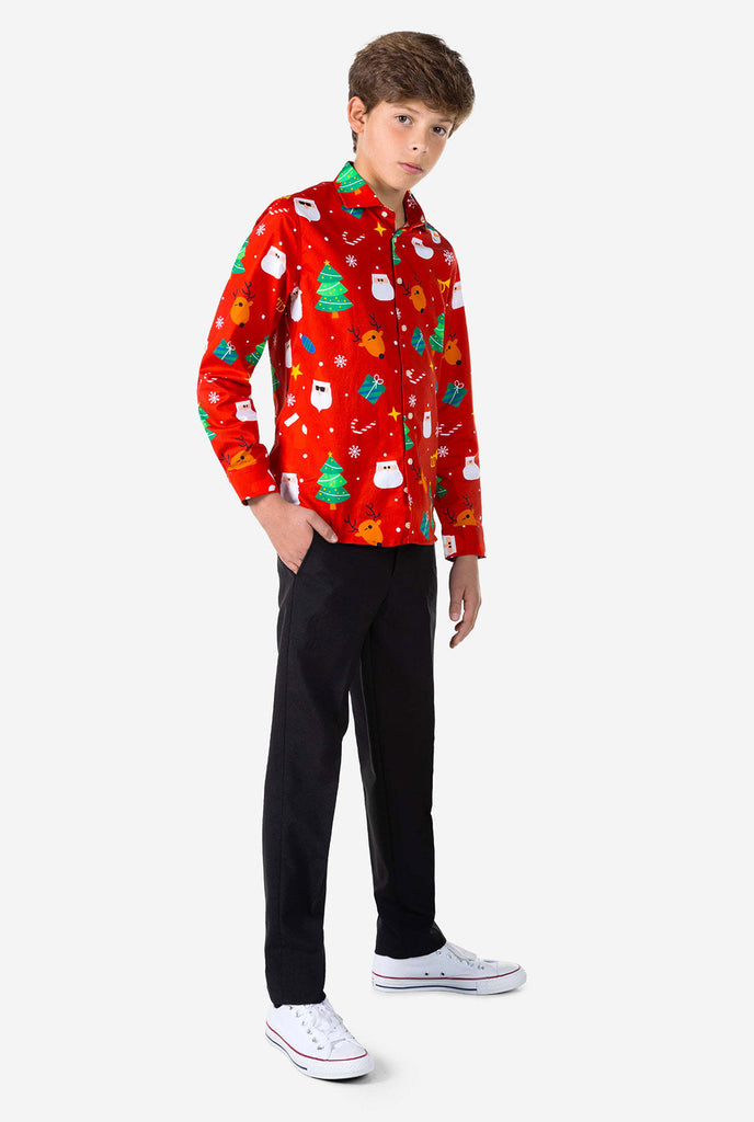 Teen wearing red dress shirt with Christmas print