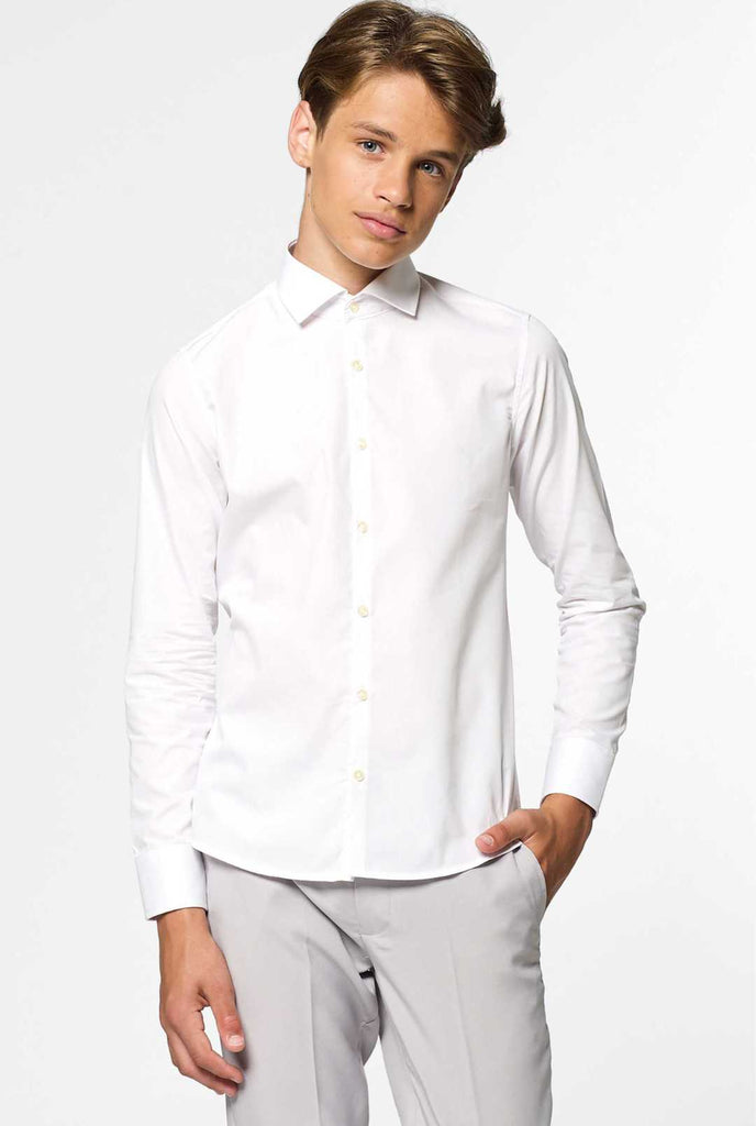 Long sleeve white shirt for boys worn by boy with hand in pocket