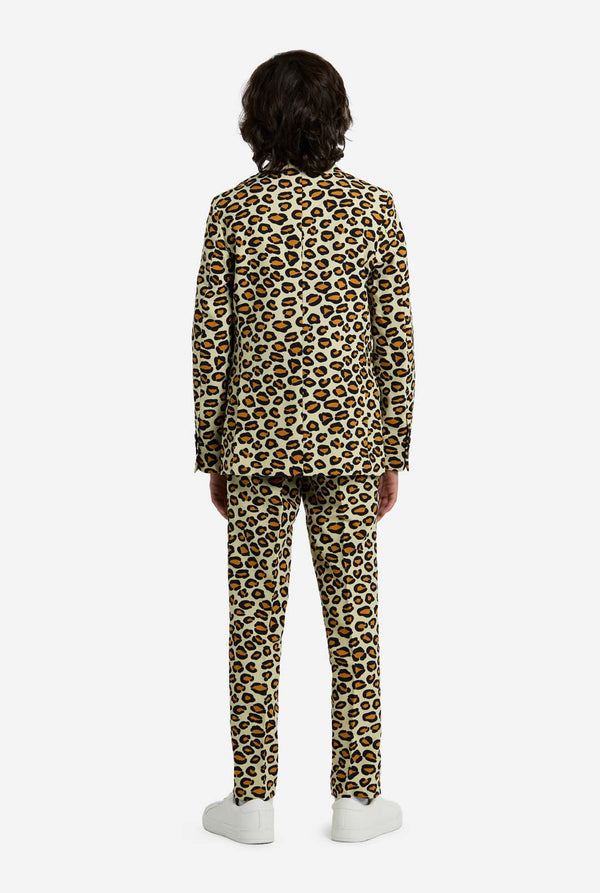 Person wearing a leopard print suit on a white background