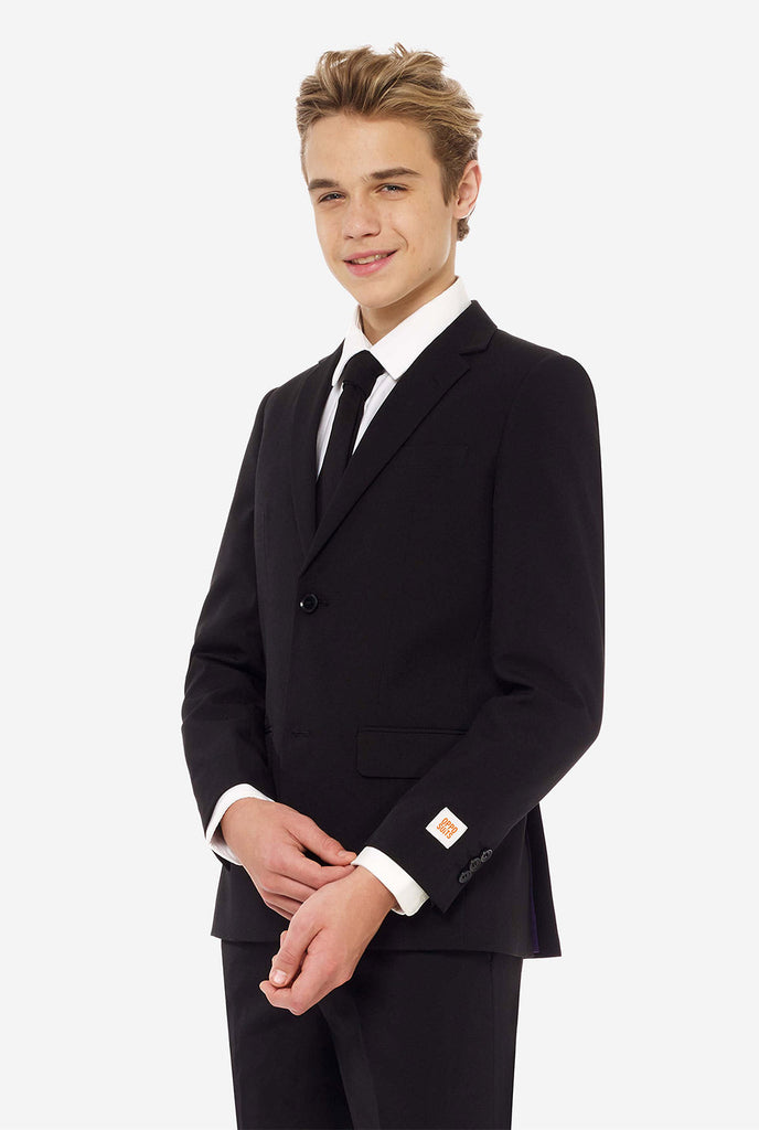 Teen wearing formal black suit