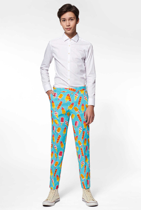 Teen wearing light blue formal suit with popsicle print