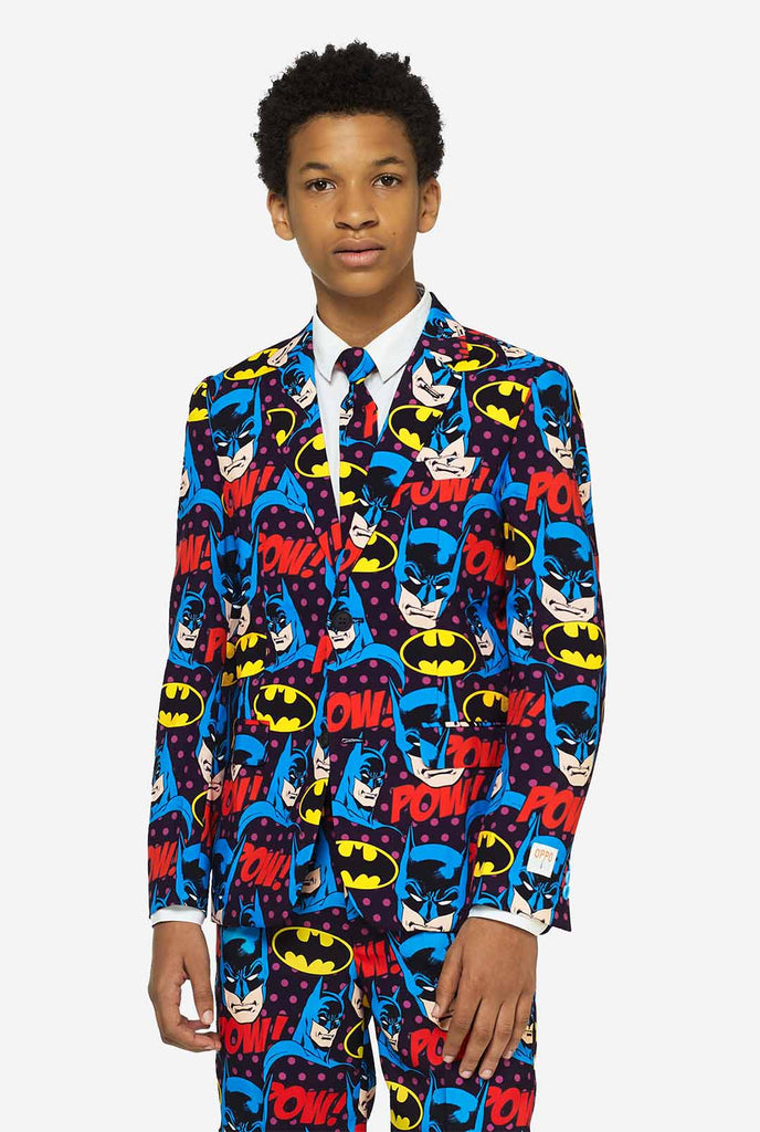 Teen wearing form suit with Batman print