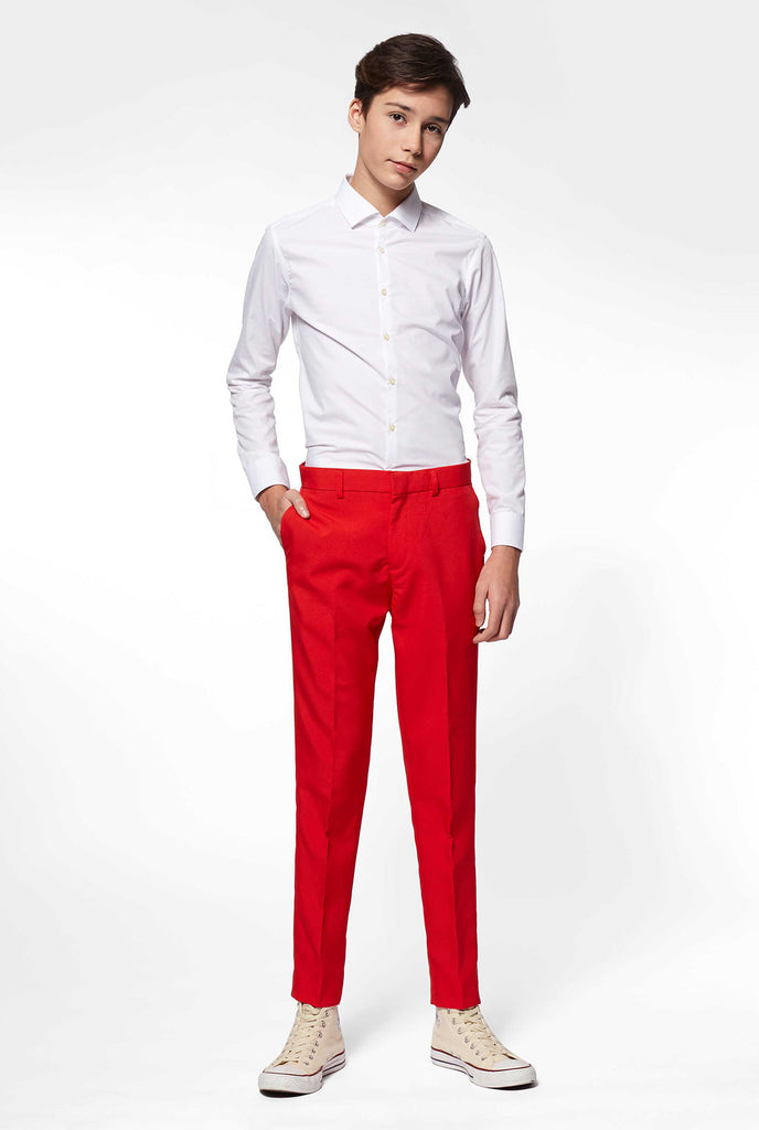 Teen wearing red formal suit