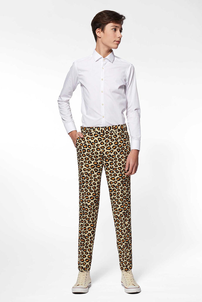 Teen wearing formal suit with panther print