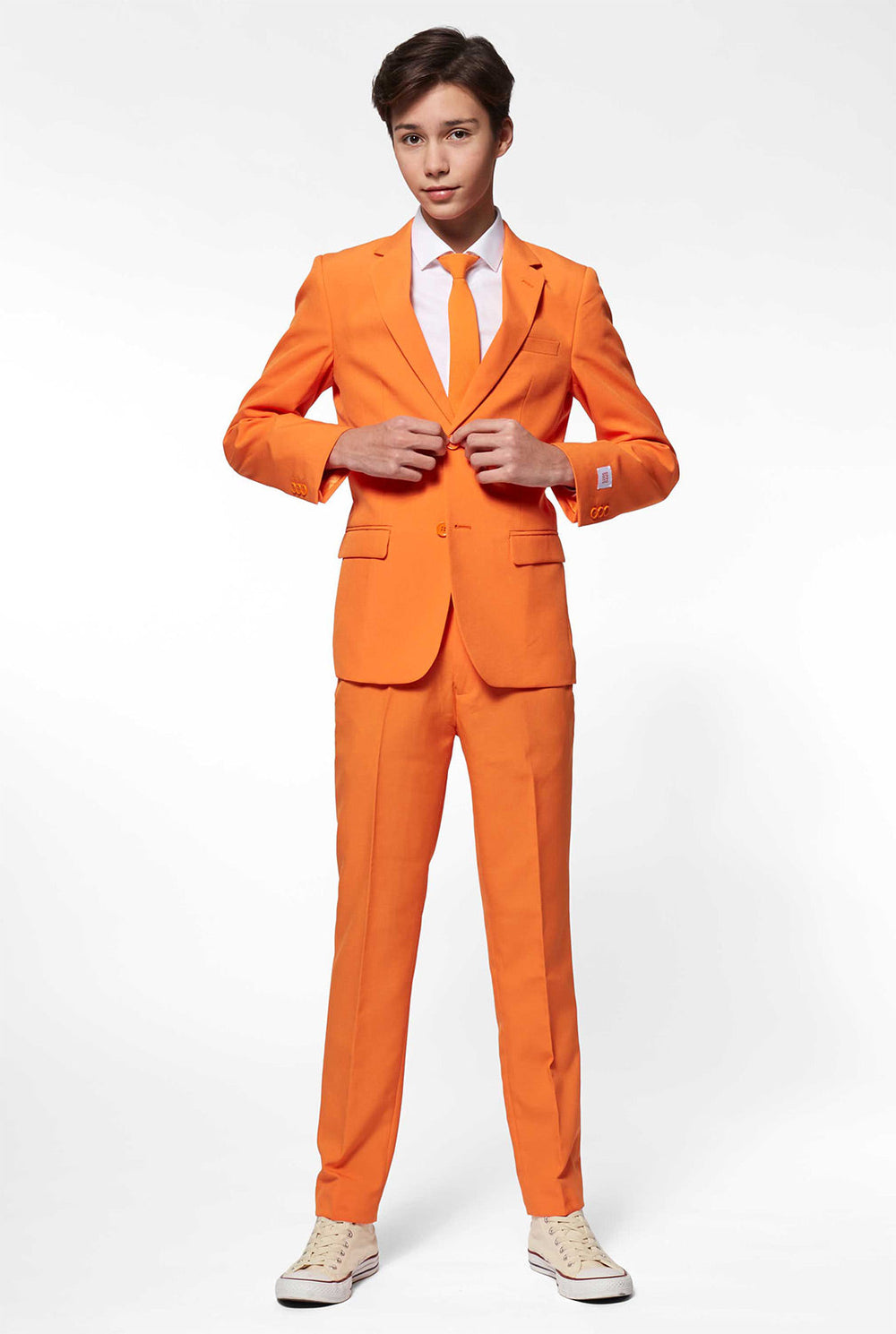 Teen wearing orange formal suit