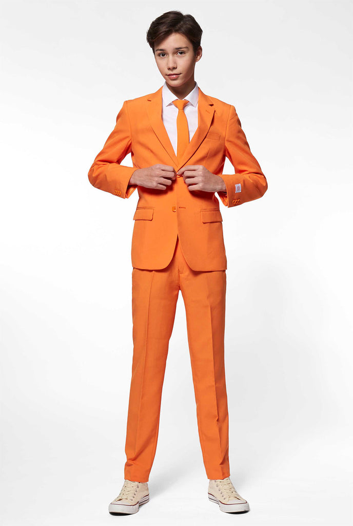 Teen wearing orange formal suit