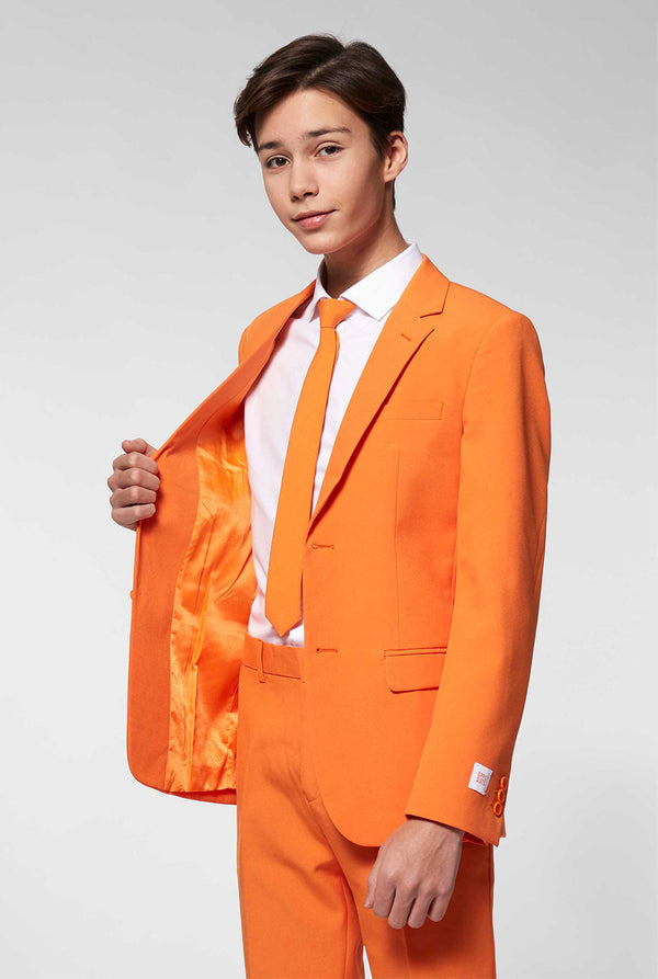 Teen wearing orange formal suit