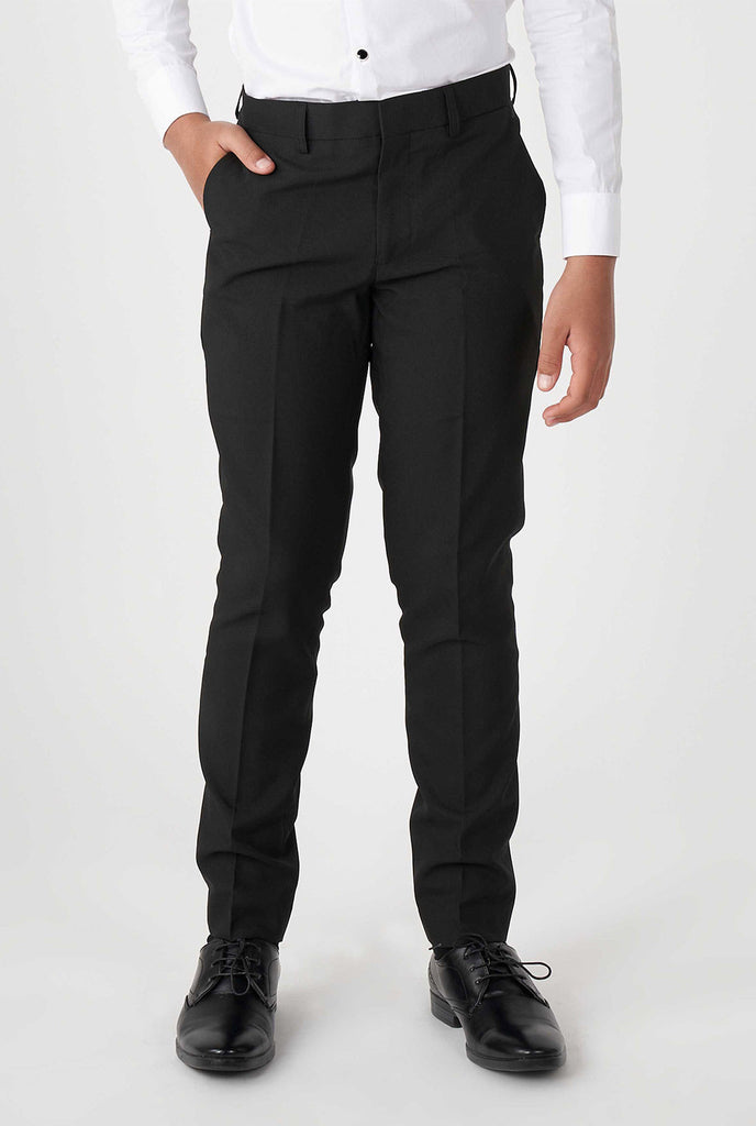 Teen wearing black tuxedo