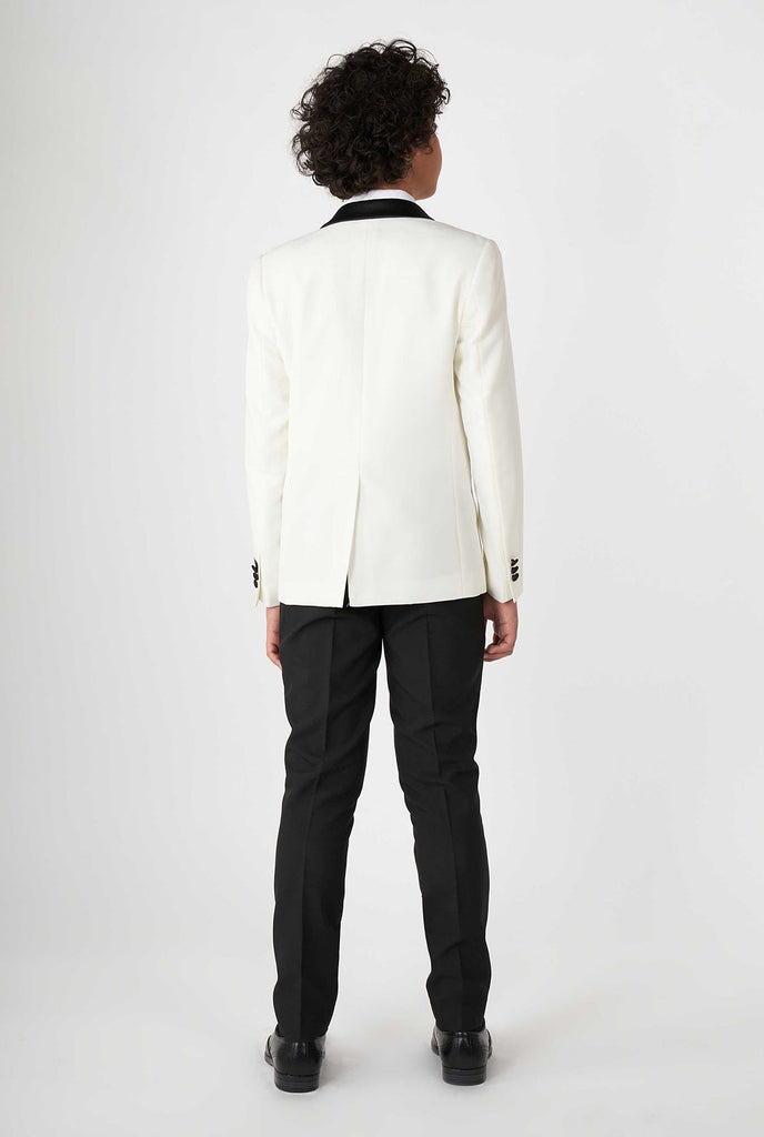 Teen wearing white and black tuxedo