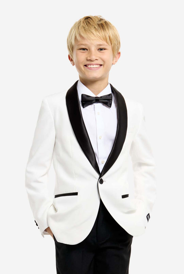 Person wearing a white tuxedo with black bow tie and pants on a white background