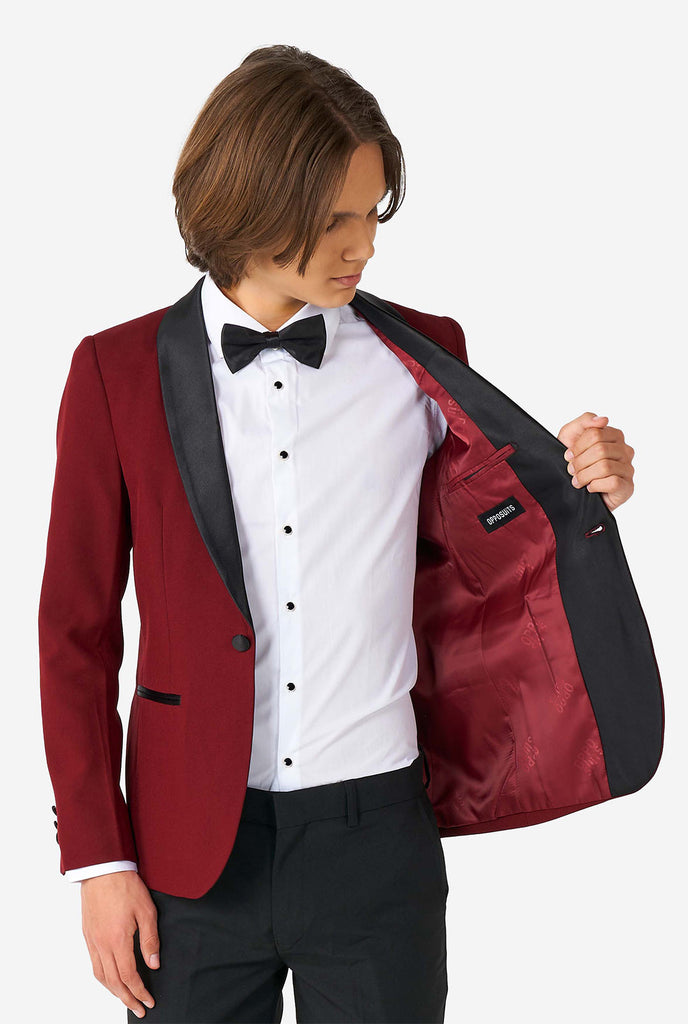 Teen wearing Burgundy red and black tuxedo