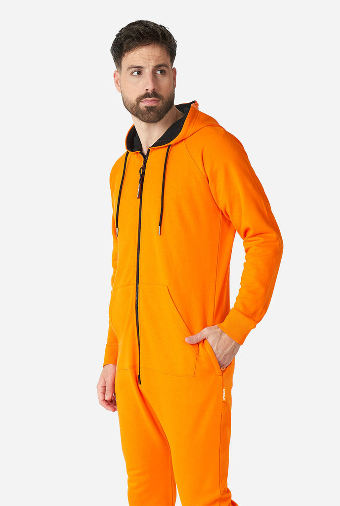 Man wearing orange onesie